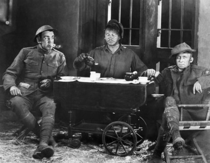 Tom Kennedy, Wallace Beery, Raymond Hatton, on-set of the Silent Film "Behind the Front", 1926