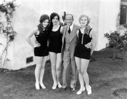 Director Harry Beaumont with Chorus Girls, on-set of the Film "The Broadway Melody", 1929