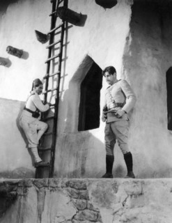 Richard Arlen, (right), on-set of the Silent Film "The Four Feathers", 1929