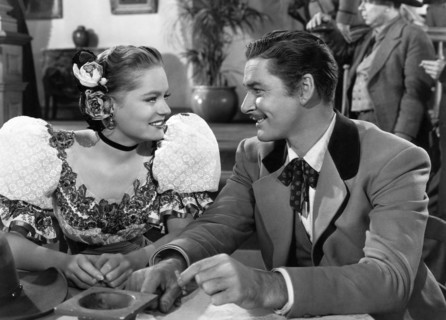 Alexis Smith, Errol Flynn, on-set of the Film "San Antonio", 1945