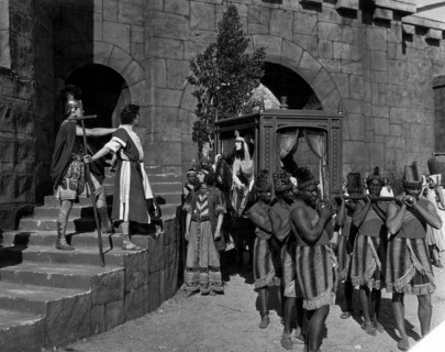 Albert Roscoe, (holding cross), Theda Bara, on-set of the Silent Film "Salome", 1918