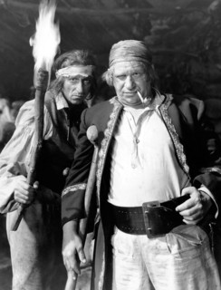 Wallace Beery, (right), on-set of the Film "Treasure Island", 1934