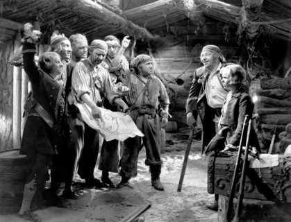 Wallace Beery, Jackie Cooper (right), on-set of the Film "Treasure Island", 1934