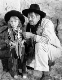 Wallace Beery and his daughter, Carol Ann Beery, on-set of the Film "Viva Villa!", 1934