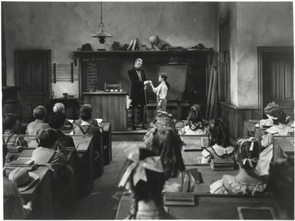 Tom Kelly in Classroom Scene, on-set of the Film “The Adventures of Tom Sawyer”, 1938