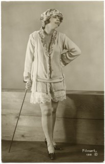 Portrait of Fashionable Woman in Short Skirt and Leaning on Cane, French Postcard, circa 1930