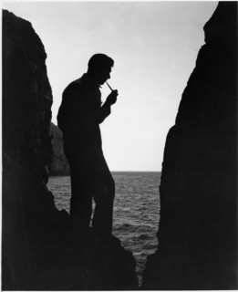 Richard Arlen, Silhouette Portrait Smoking Pipe at Beach, on-set of the Film, "Island of Lost Souls", 1932