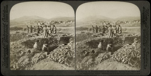 Burying the Russians killed in the desperate fighting on 203 Metre Hill in Besieged Port Arthur, Stereo Card, Underwood & Underwood, 1905