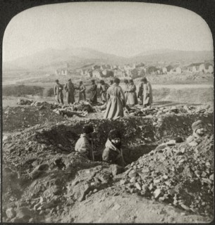 Burying the Russians killed in the desperate fighting on 203 Metre Hill in Besieged Port Arthur, Single Image of Stereo Card, Underwood & Underwood, 1905