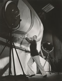 Charles Ruggles, Full-Length Publicity Portrait, On-set Attempting to Support a Stage Prop, Bert Longworth for Paramount Pictures, 1934