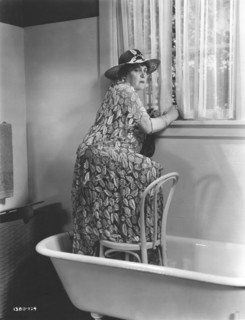 Alison Skipworth, Publicity Portrait Standing in Bathtub on-set of the Film, "Madame Racketeer", Paramount Pictures, 1932