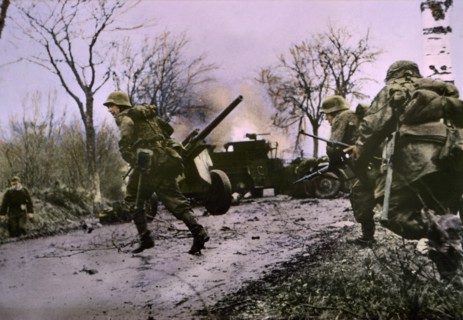 Enemy Troops Passing Burning U.S. Equipment, Ardennes-Alsace Campaign, Battle of the Bulge, 1945