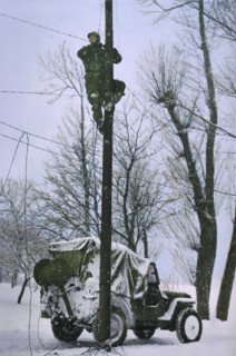 Signal Corps Lineman Repairing Damaged Telephone Lines, Ardennes-Alsace Campaign, Battle of the Bulge, 1945