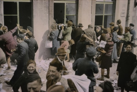 Liberated Slave Laborers Help Themselves to Food and Supplies in Store, Hanover, Germany, Central Europe Campaign, Western Allied Invasion of Germany, 1945