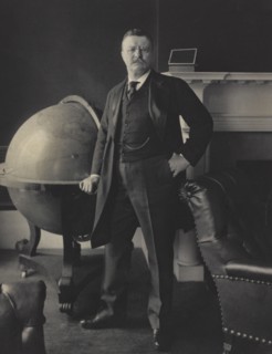 U.S. President Theodore Roosevelt, Full-Length Portrait Standing beside Large Globe, by George G. Rockwood, 1903