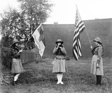 Three Girl Scouts, Two Holding Flags and one Playing Trumpet, Washington DC, USA, National Photo Company, 1920