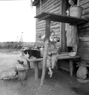 Young Child of Sharecropper on Rural Porch, Chesnee, South Carolina, USA, Dorothea Lange, Farm Security Administration, June 1937