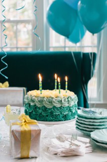 Blue Birthday Cake with Lit Candles