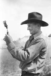 Cowboy Filling Syringe with Blackleg Serum, Quarter Circle U Ranch Roundup, Montana, USA, Arthur Rothstein, Farm Security Administration, June 1939