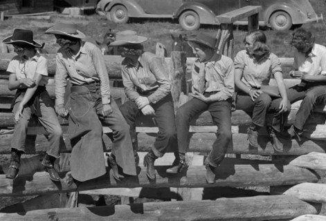 Dude Girls on a Corral Fence, Quarter Circle U Roundup, Montana, USA, Arthur Rothstein, Farm Security Administration, June 1939