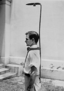 Richbourg Gailliard, assistant to the director of the Federal Museum, Demonstrates the use of a Bell Rack, a Contraption used by Slave Owners to guard a Runaway Slave, originally topped by a bell, whi...