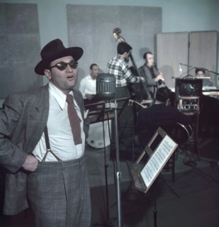 Portrait of Frankie Laine (foreground) and Jimmy Crawford (background on drums), New York City, New York, USA, William P. Gottlieb Collection, 1948
