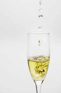 Champagne Dropping into Glass