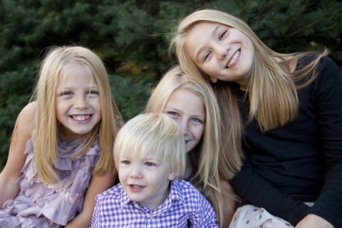 Four Smiling Siblings