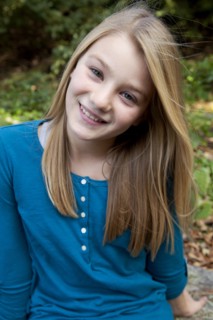 Smiling Blonde Girl Tilting Head