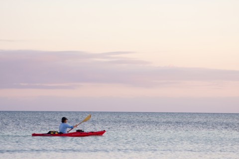 Man Kayaking on Ocean, Florida Keys, USA