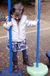 Girl Playing at Playground