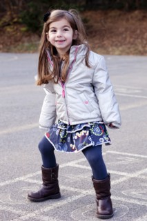 Girl Standing on Hopscotch Court