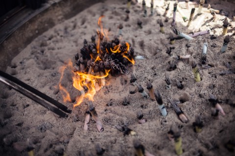Burning Scrolls and Incense at Temple, Tokyo, Japan