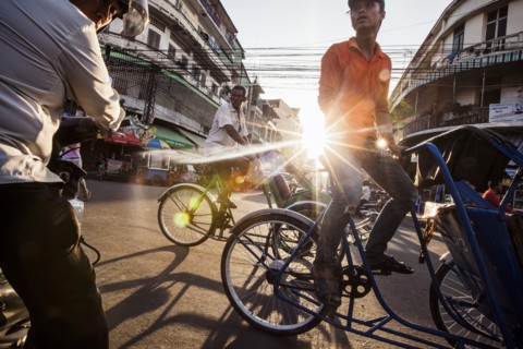 Cyclo Drivers on Busy Street, Phnom Penh, Cambodia