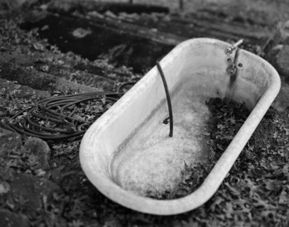 Old Dirty Bathtub Outside
