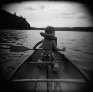 Boy in Canoe