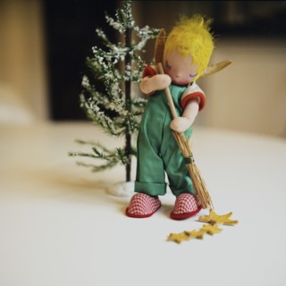 Christmas Elf Sweeping by Tree