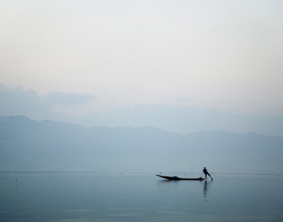 Man Leg Rowing on Lake Inle in Burma