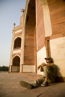 Man Sitting Against Humayun's Tomb, New Delhi, India