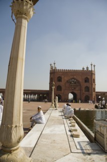 Men Sitting by Jama Masjid Mosque Pool, Delhi, India