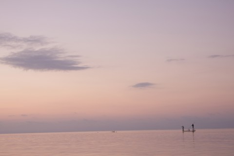 Two Men Fishing in Boat on Calm Water, Florida Keys, USA