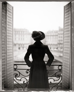 Woman Standing on Balcony, Rear View, Paris, France,