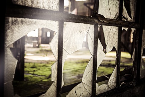 Broken Window in Abandoned Warehouse