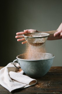 Flour and Cake Mix Being Sifted into Bowl