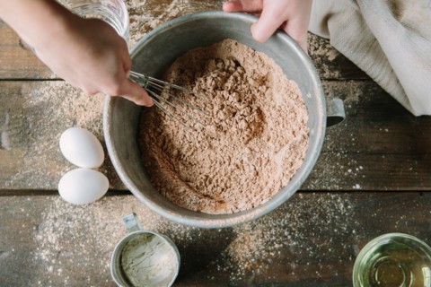 Ingredients Being Whisked in with Cake Mix, High Angle View