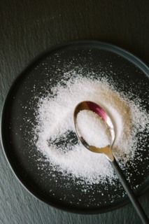Salt and Spoon in Dish, High Angle View