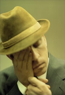 Man with Hand on Face