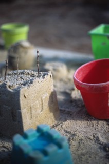 Sand Castle and Pails in Sandbox