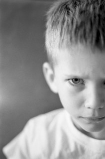 Young Boy With Angry Expression