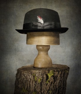 Men’s Bowler Hat on Tree Stump